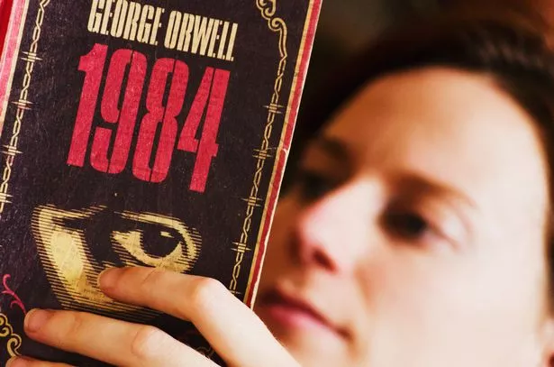 Person reading 1984
